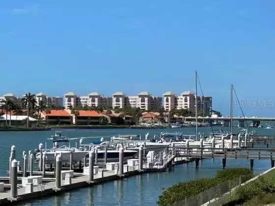 Our marina is on a wide deep-water channel with no bridges to open water.