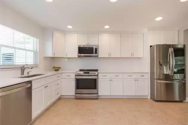 New, bright, and high-end kitchen...