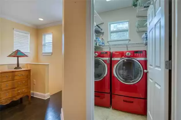 Laundry room conveniently located on the second floor makes doing laundry easy and hassle free