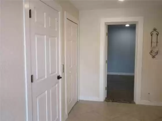 Doors on left to elevator and 1/2 bath