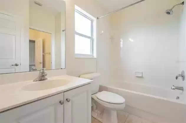 Upstairs Bathroom offers entry from hall and bedroom #3