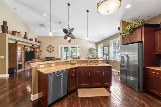open kitchen with large bar top/island