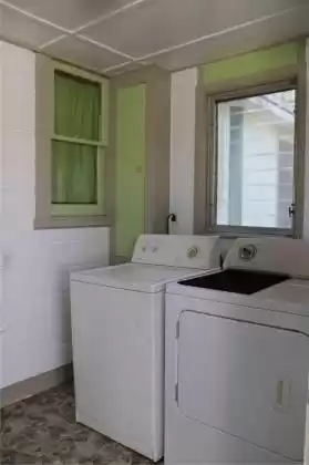 Laundry room is right off of kitchen attached to home!