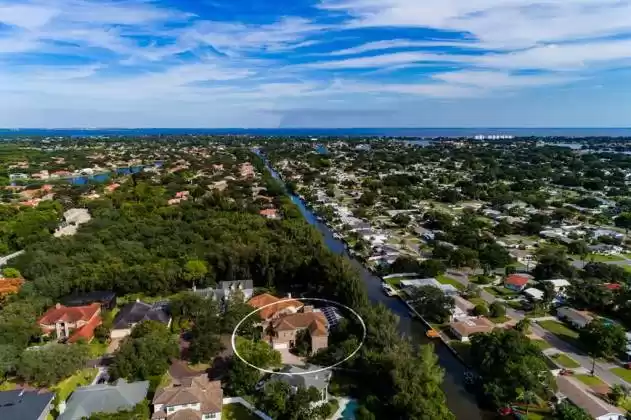 Amazing waterfront estate in Brick walled, gated Waterford Estates only 1 of 2 waterfront residences in this enclave with dock & boating access!