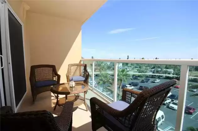 Enjoy the gorgeous Florida weather from the balcony.