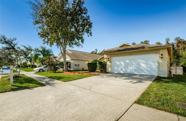 31308 WRENCREST DRIVE, ZEPHYRHILLS, Florida 33543, 3 Bedrooms Bedrooms, ,2 BathroomsBathrooms,Residential,For Sale,WRENCREST,MFRU8223359