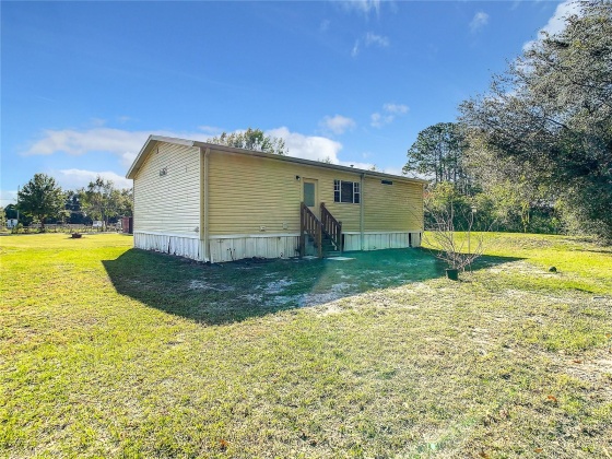 7042 SKY DRIVE, WESLEY CHAPEL, Florida 33545, 3 Bedrooms Bedrooms, ,2 BathroomsBathrooms,Residential,For Sale,SKY,MFRW7860332