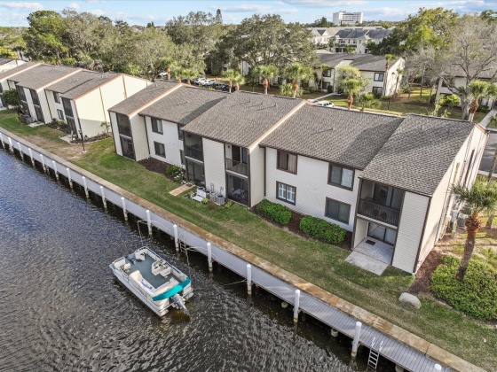 327 MOORINGS COVE DRIVE, TARPON SPRINGS, Florida 34689, 2 Bedrooms Bedrooms, ,2 BathroomsBathrooms,Residential,For Sale,MOORINGS COVE,MFRU8225743